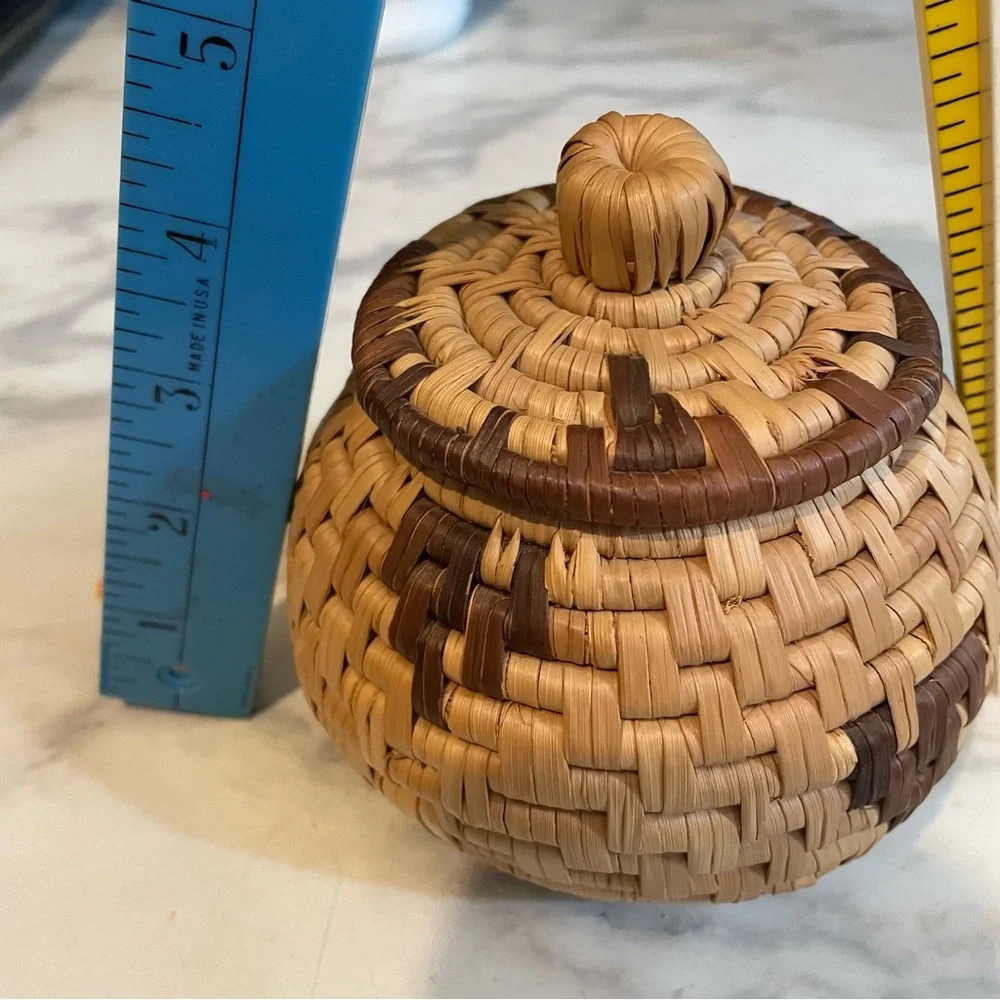 Miniature Hand Woven basket with lid. 4 1/2 inches x 4 1/2 inches.